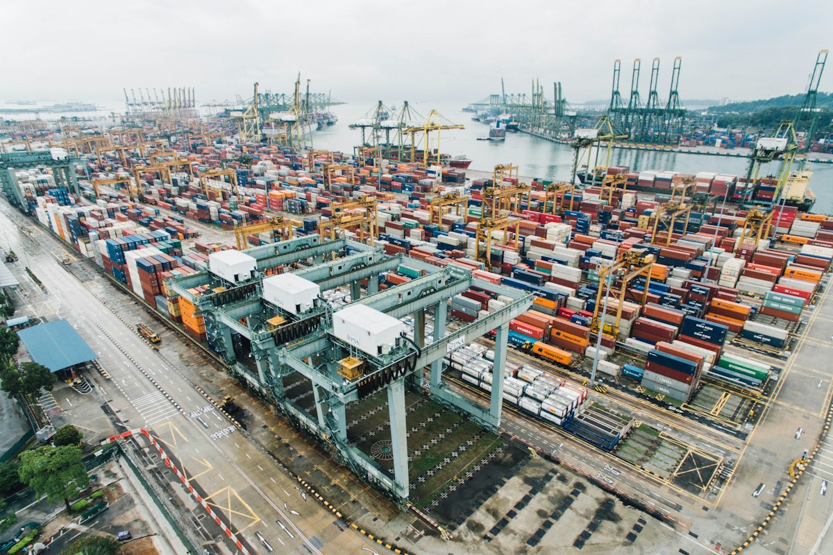 Colourful stacked shipping containers at a cargo terminal