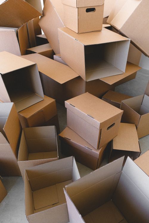 Stack of cardboard moving boxes prepared for international relocation
